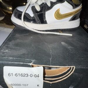 Nike Black and Gold Sneakers